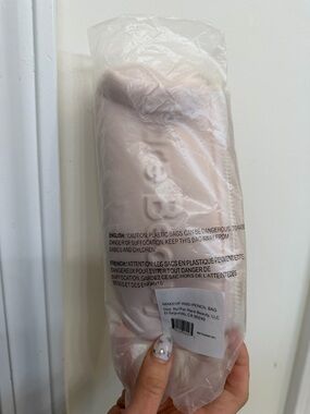 Rare Beauty blush-toned makeup and pencil bag